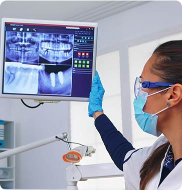 dentist reviewing dental radiograph Windsor Ontario