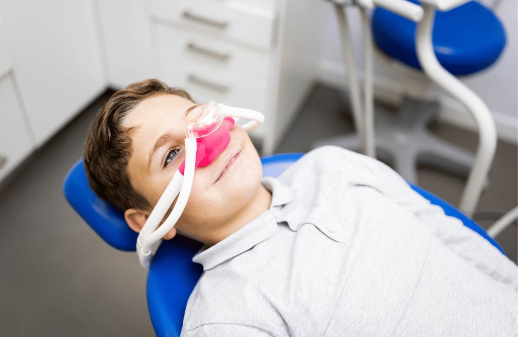 patient using nitrous oxide mask Windsor dental clinic
