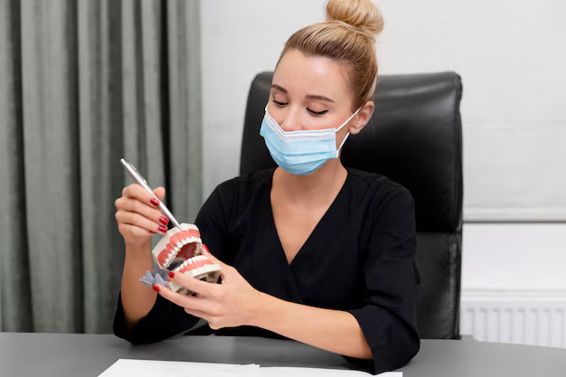 dentist applying fluoride varnish Windsor Ontario
