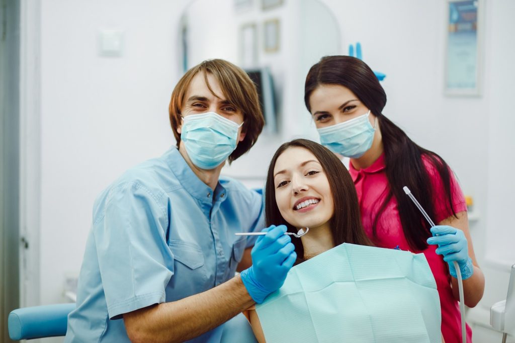 dentist placing composite filling Windsor Ontario