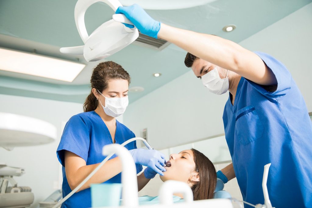 professional dentist Windsor treating patient